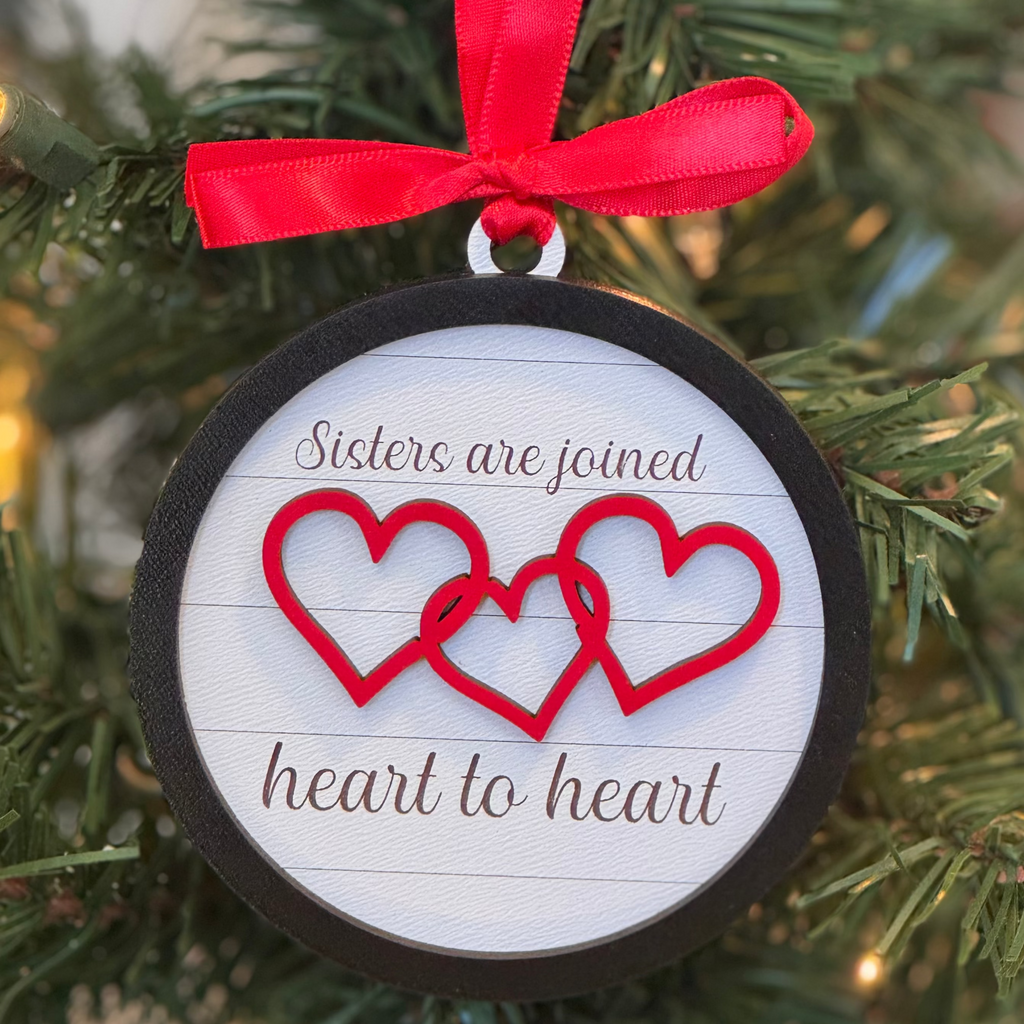 Sisters Joined Heart to Heart